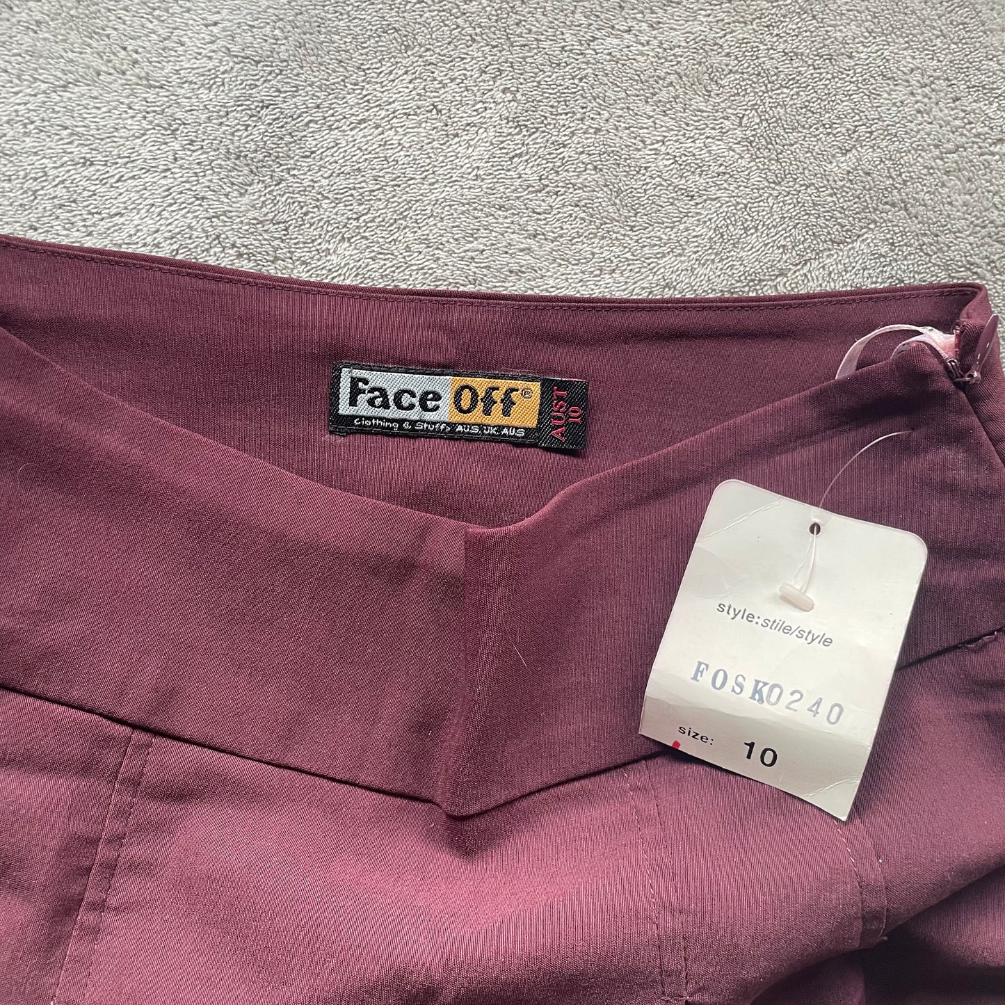 Face off burgundy pleated mini skirt