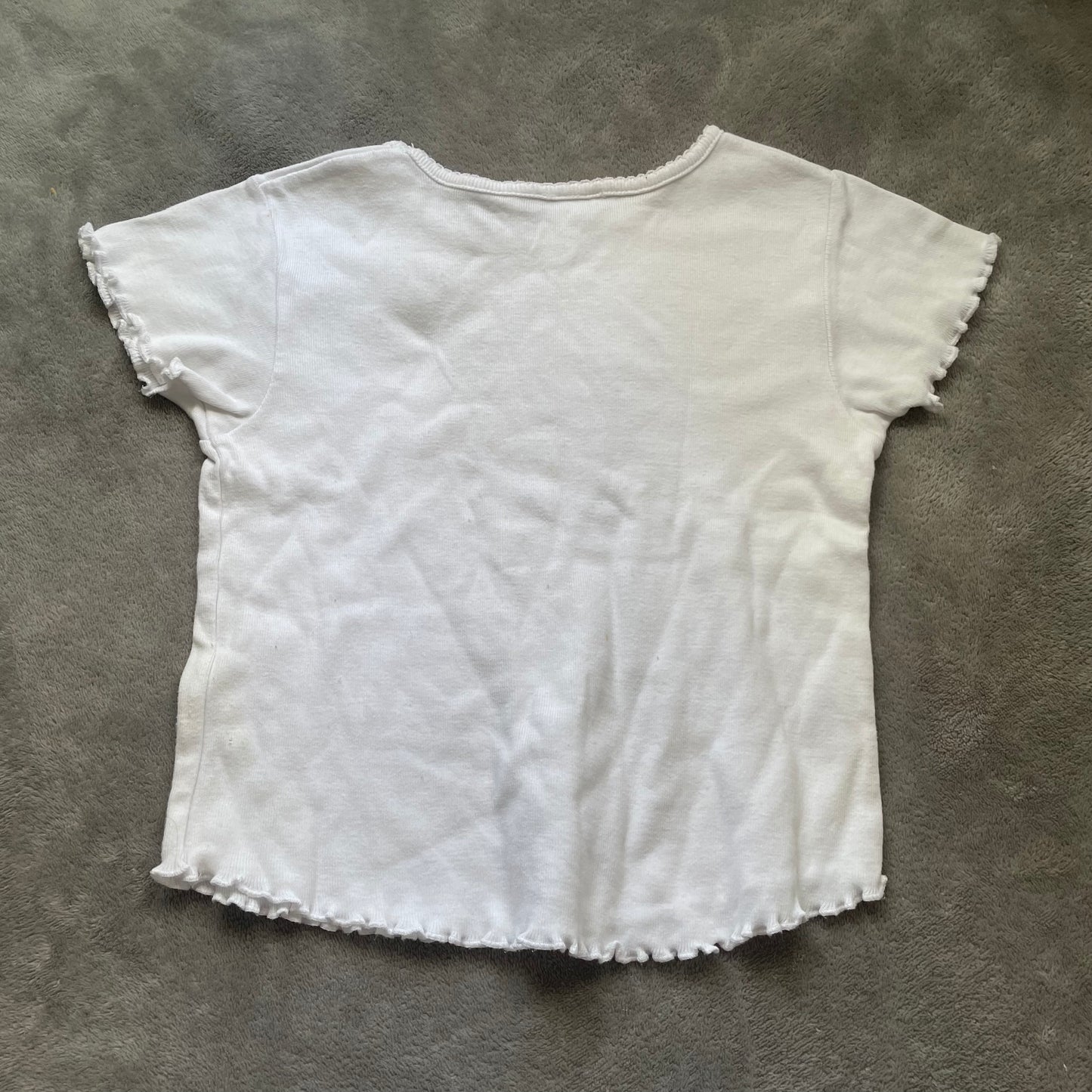 White baby tee with cute detailing