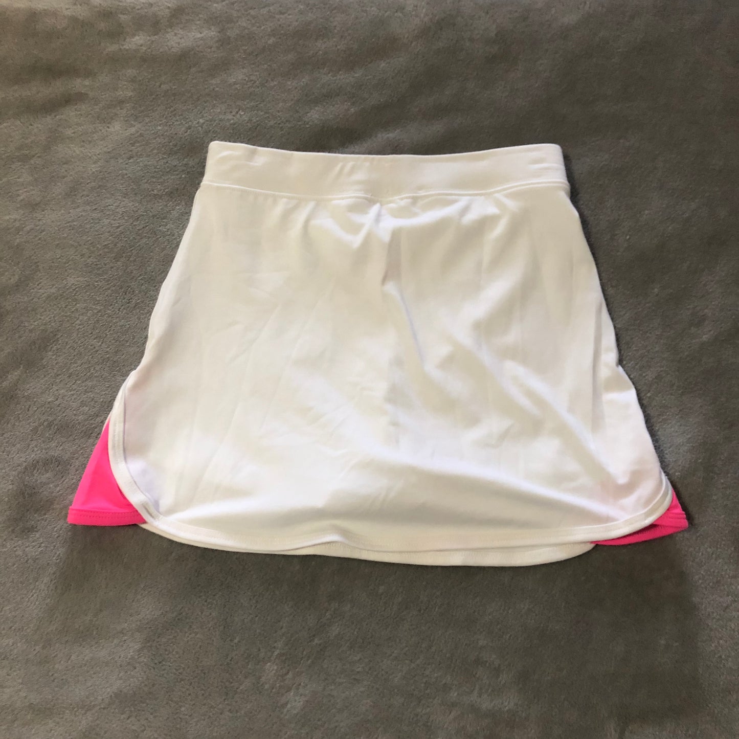 White and pink mini tennis skirt