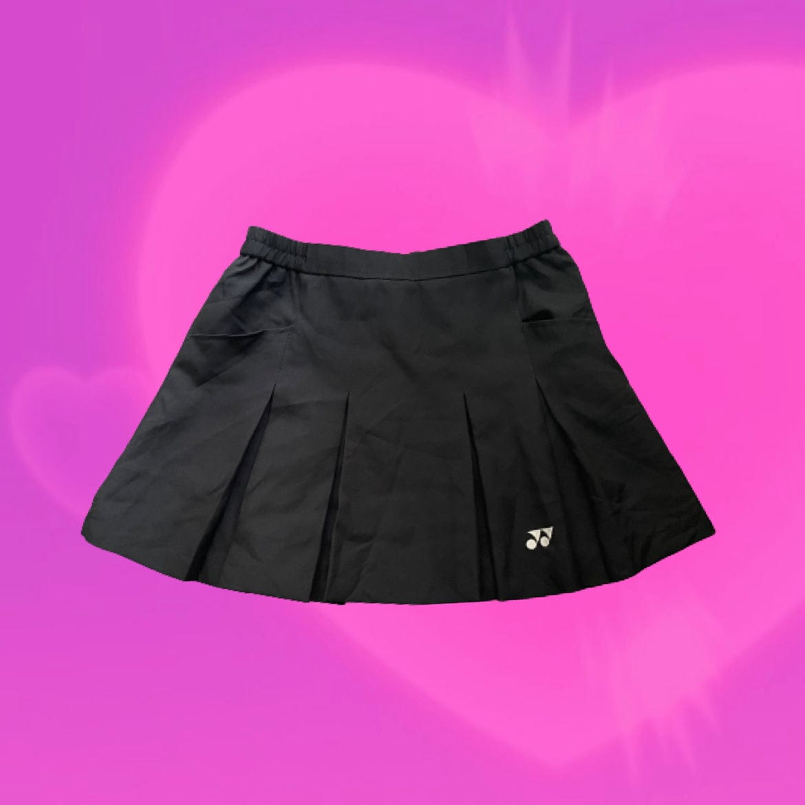 Pleated mini skirt with pockets