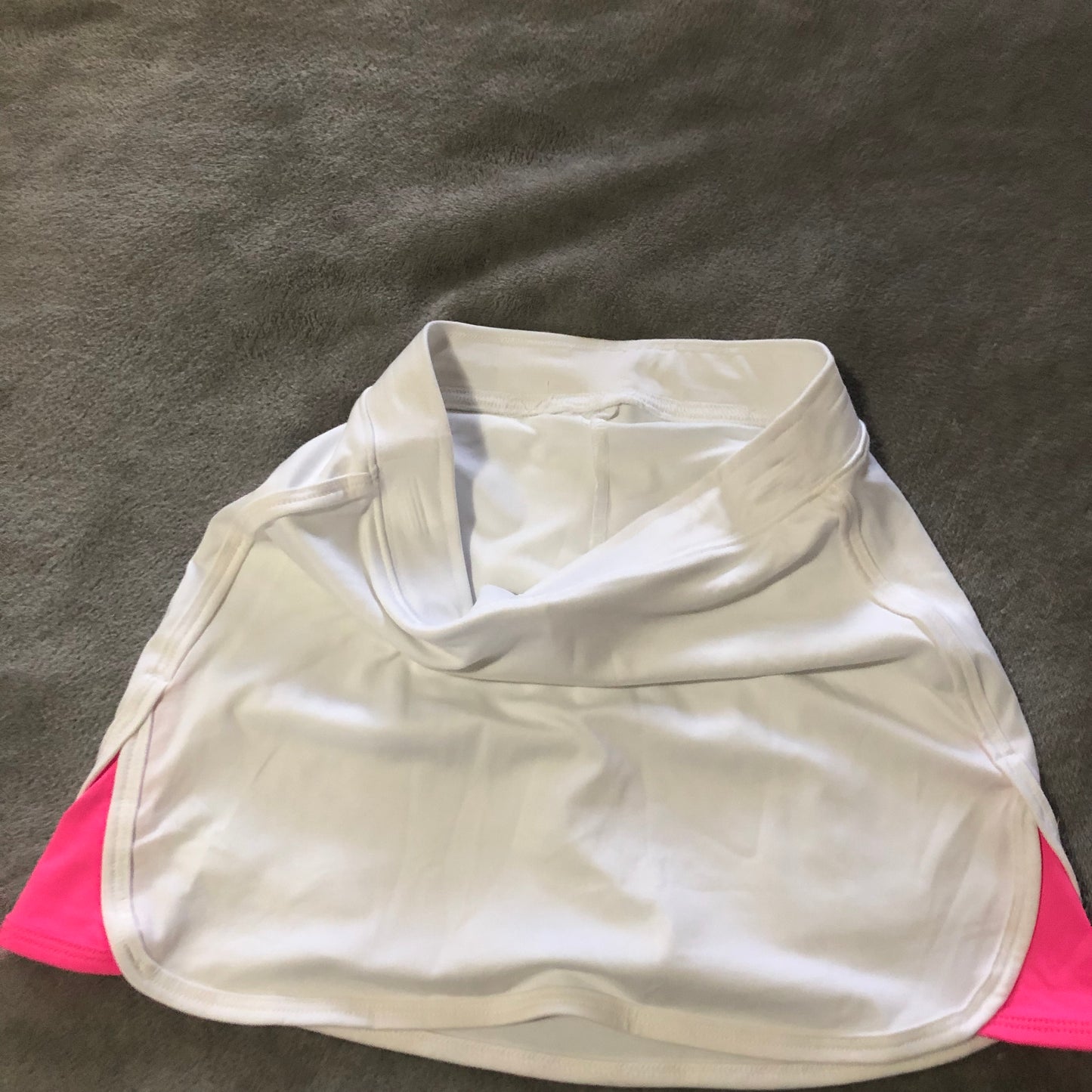 White and pink mini tennis skirt