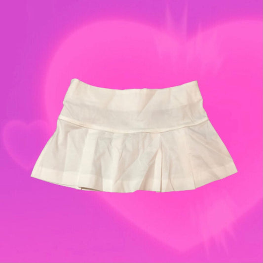 Pleated white mini skirt